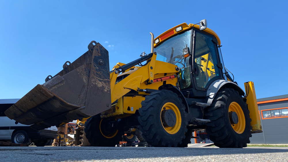 The backhoe loader is a type of road construction equipment.